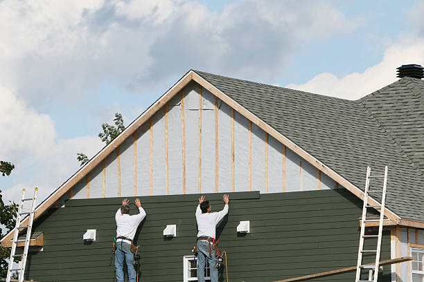 Professional Emergency Siding Repair technician working in Keller, TX
